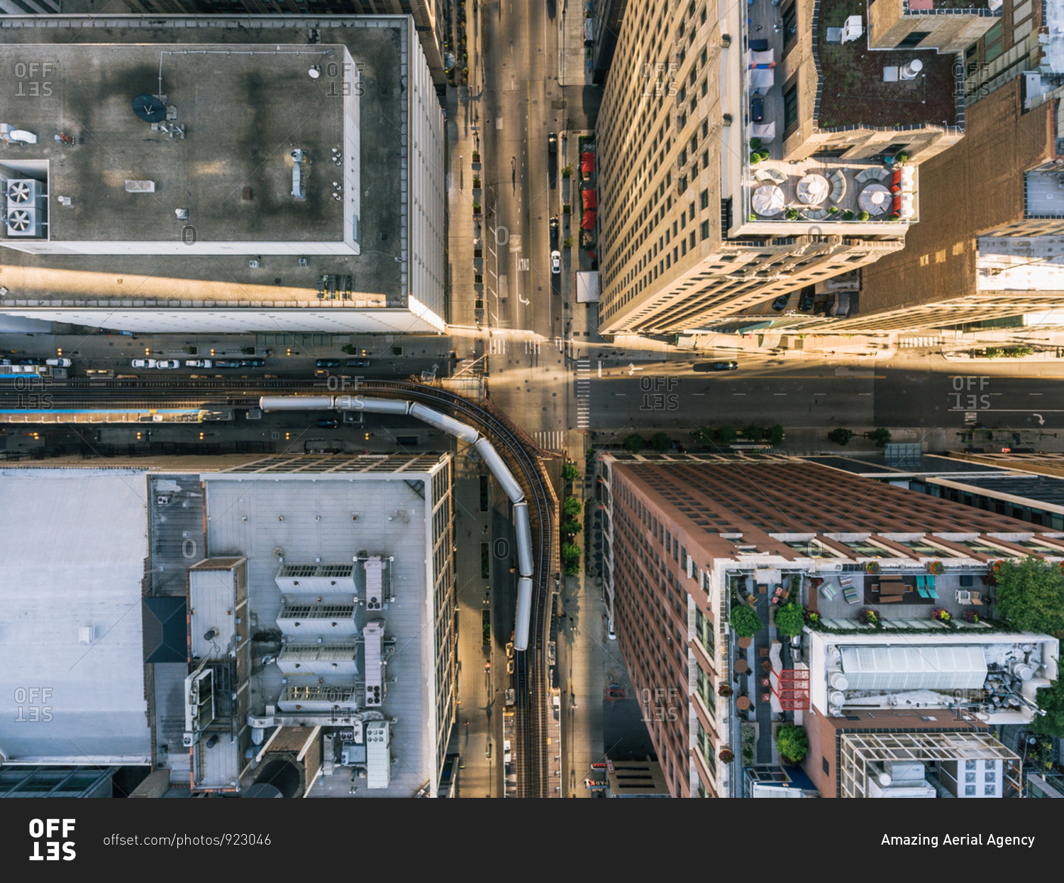 Aerial view of a train crossing over empty streets due to the corona virus pandemic at Chicago, United States.