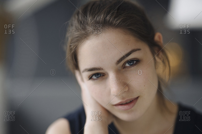 Portrait of daydreaming young woman