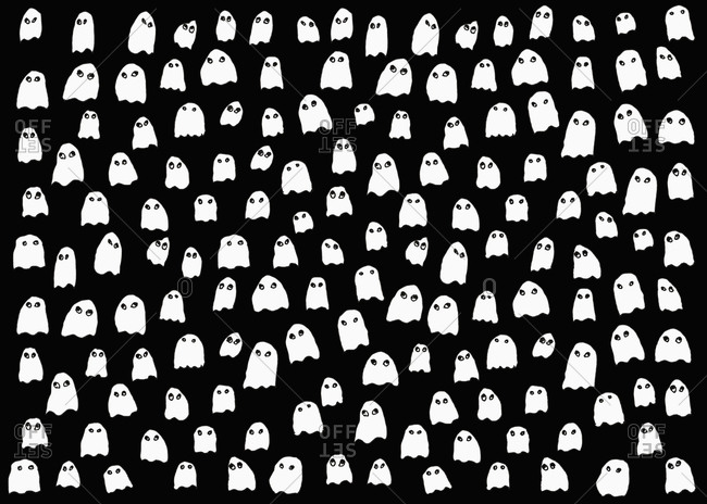 Drawing of small white ghosts on black background stock photo - OFFSET