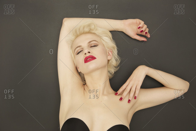 Portrait sensual glamorous young woman with red lipstick