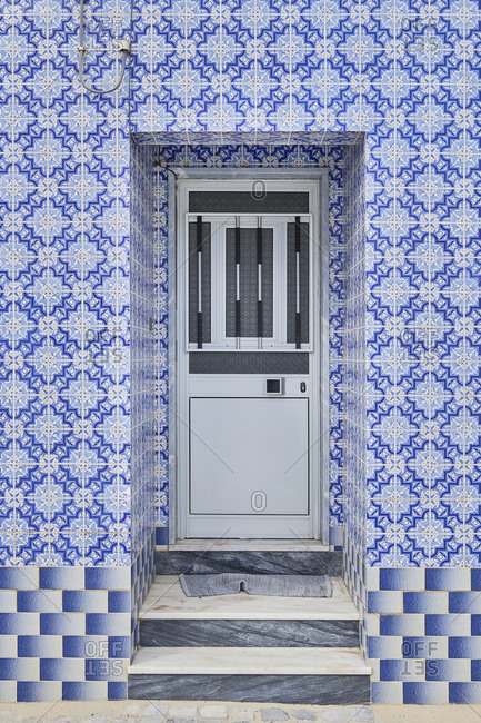 Cabanas de Tavira, Portugal - January 26, 2020: Home with decorated tile around door in Tavira, Algarve, Portugal