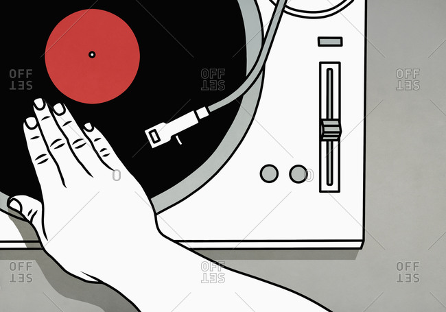 DJ spinning vinyl record on turntable