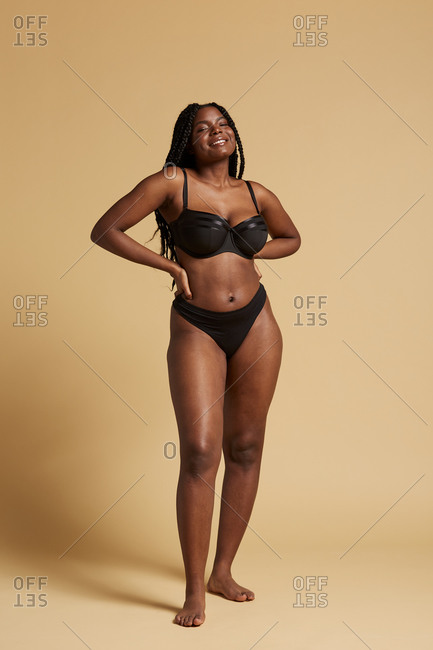 Beautiful African-American Girl Posing In Black Lace Lingerie Bra
