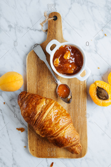 Free Photo  French breakfast with croissants, apricot jam, cherry