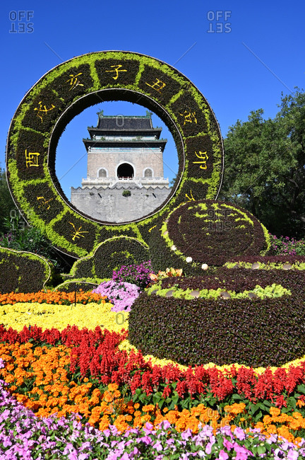 June 10, 2018: Elaborate floral decorations celebrating 70 years of China framing the Bell Tower, built in 1272, Beijing, China, Asia