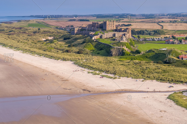 Aerial view by drone of Bamburgh Castle. Bamburgh, Northumberland, England, United Kingdom, Europe
