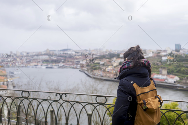 Rear view of a woman watching panoramic view of PortoPortugal