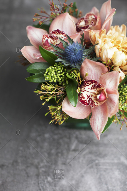 Floral arrangement with pink orchids from above