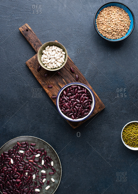 Directly above shot of various beans on dark background