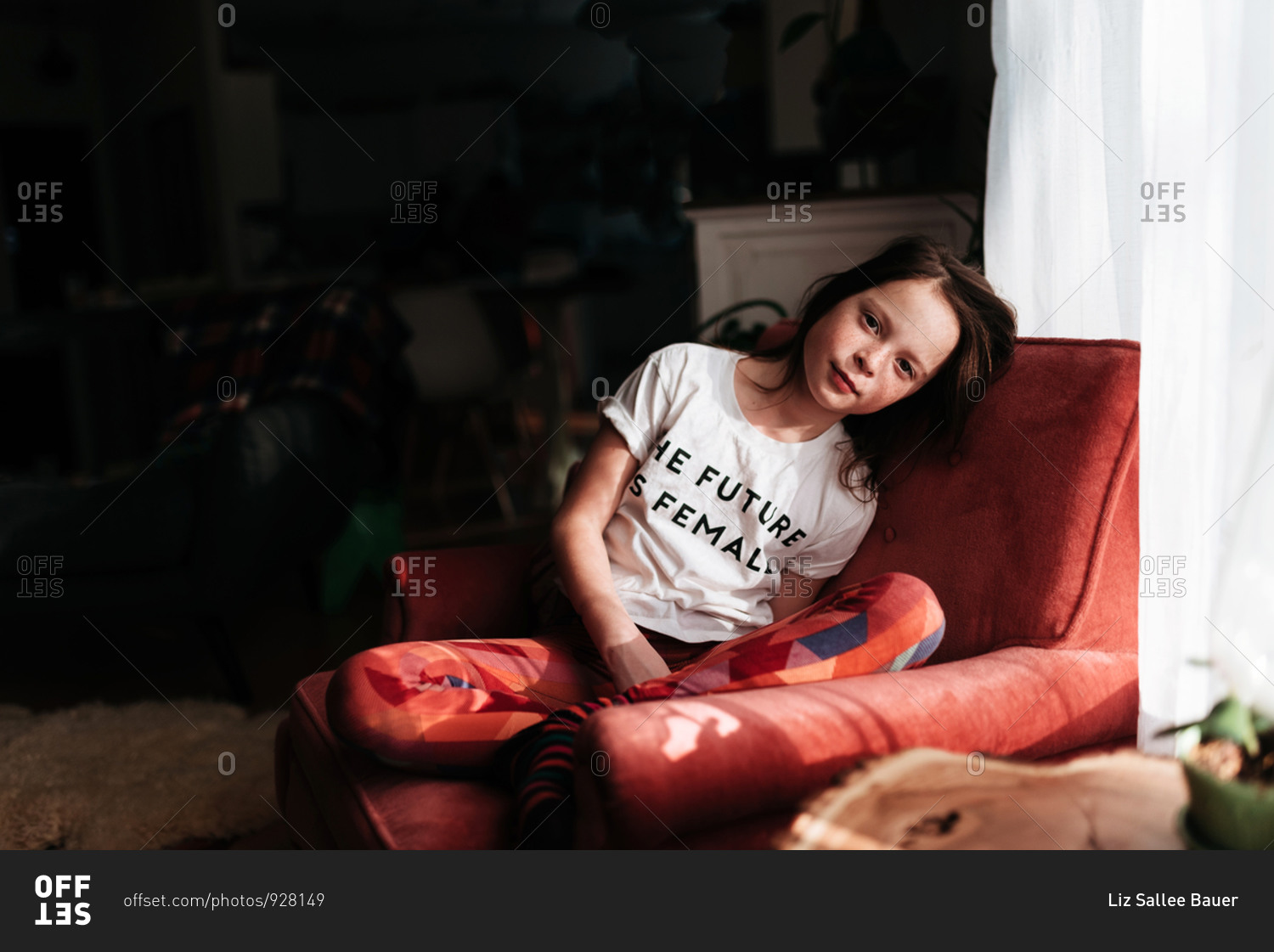 Portrait of a young girl with a shirt that says \