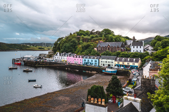 Isle of Skye, Highland Region, Scotland  - June 9, 2019: Row of houses at the harbor of Portree