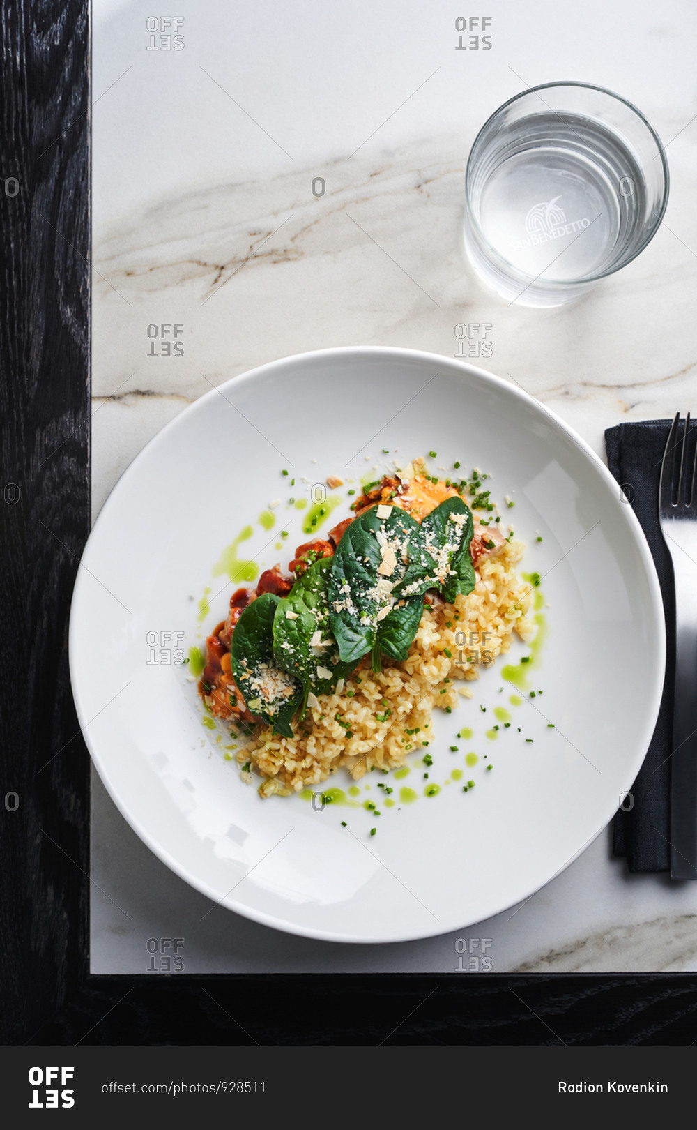 Balanced dish of bulgur, spinach and roasted chicken breast