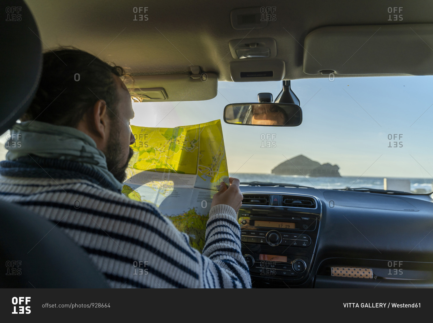Man looking at map in car- Sao Miguel Island- Azores- Portugal