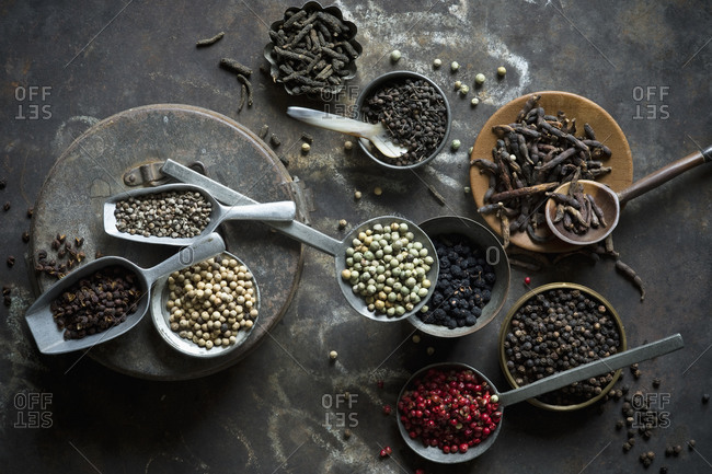 Bowls- ladles and scoops of various peppers