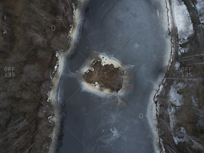 Russia- Saint Petersburg- Sestroretsk- Aerial view of islet in frozen pond
