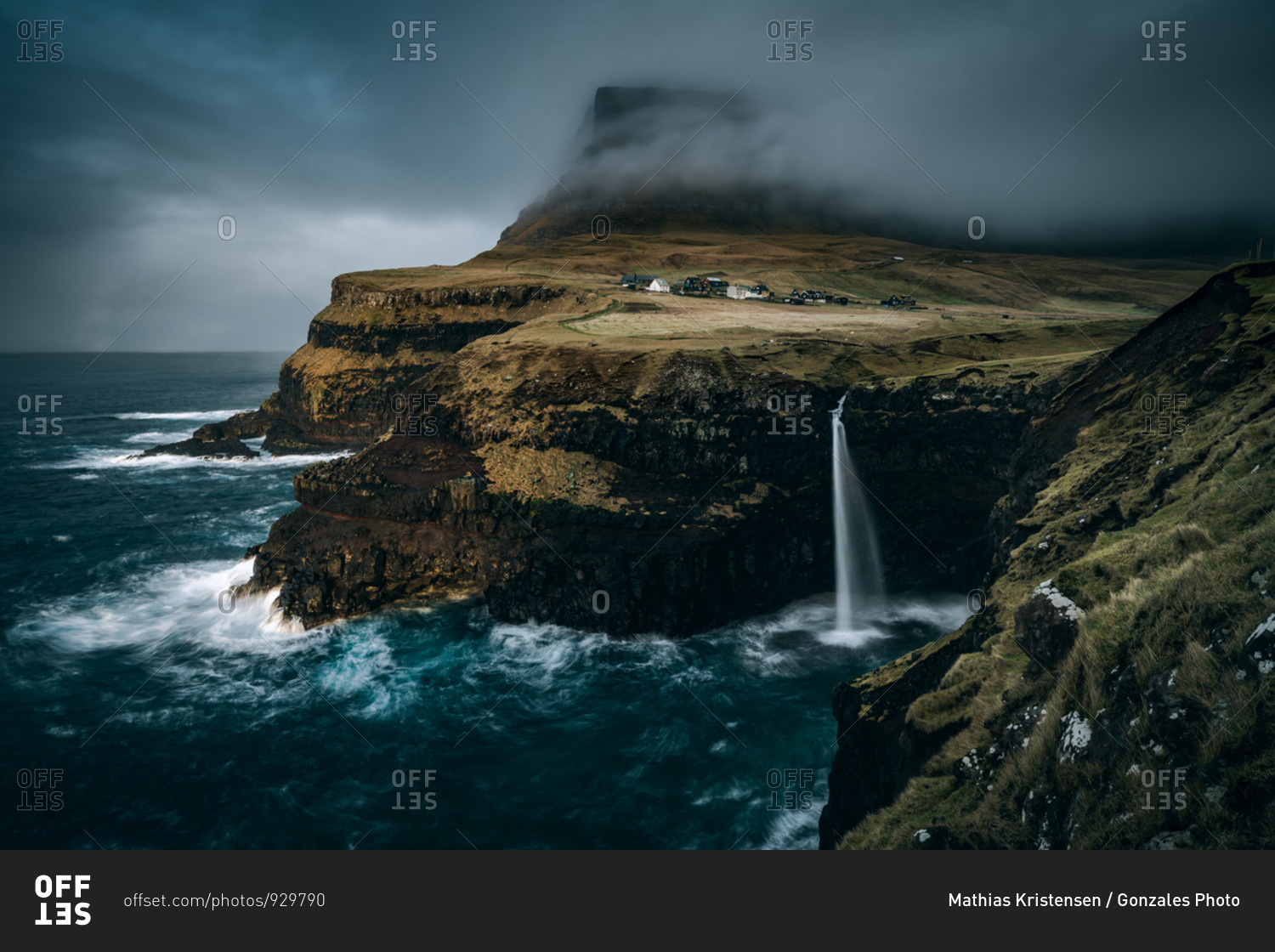 Stormy sky over the Mulafossur Waterfall at Gasadalur in the Faroe Islands