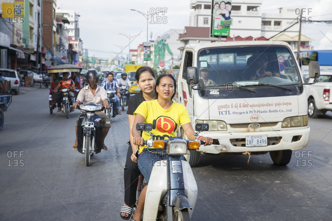 October 6, 2017: Cambodia, Phnom Penh, street scene, a family on a moped