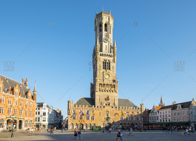 Bruges, Flanders, Belgium - August 15, 2016: 13th century Belfort van Brugge belfry tower on the Markt square, Bruges, West Flanders, Belgium