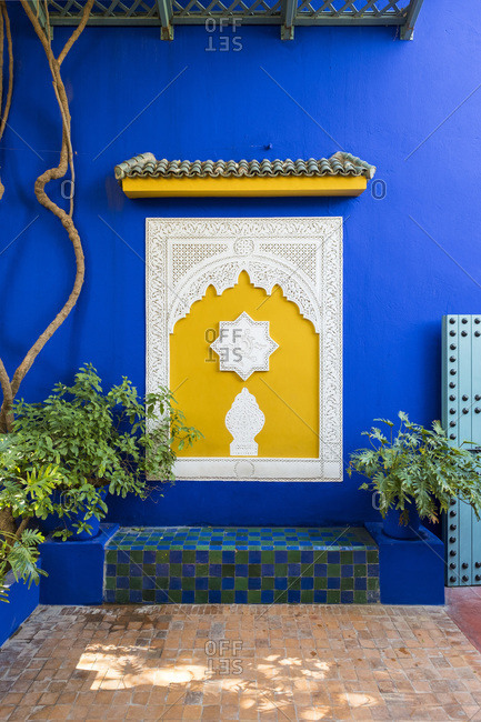 Decorative architectural elements and blue wall at Jardin Majorelle gardens, Marrakesh, Morocco