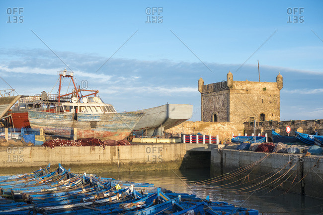 Skala du Port, 18th-century seafront ramparts and boats in the fishing port, Essaouria, Morocco