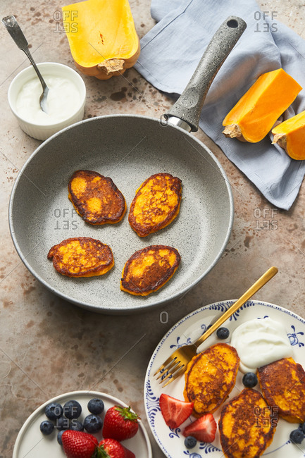 Butternut squash pancakes in a skillet