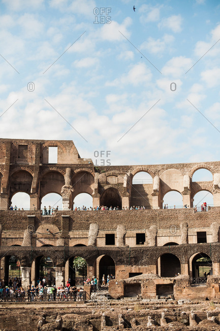 Rome, Italy - June 21, 2018: Crowds touring the Colosseum on a beautiful day