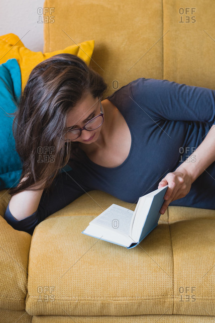 Woman Laying On The Sofa Stock Photos Offset