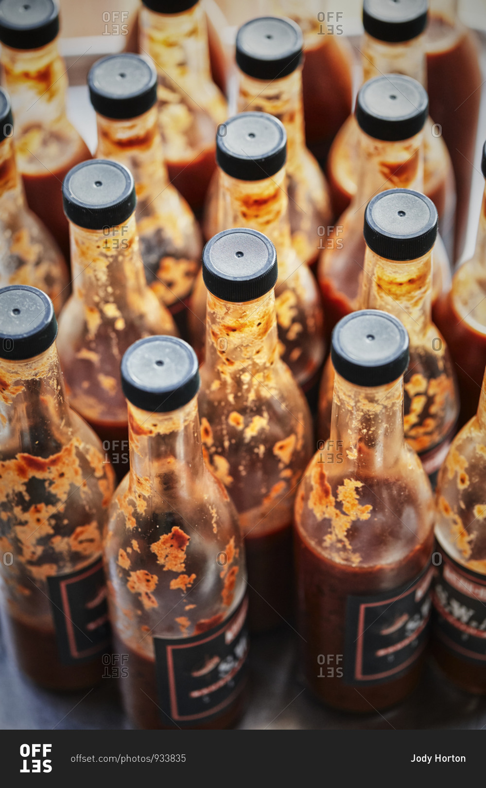 Close up of hot sauce bottles