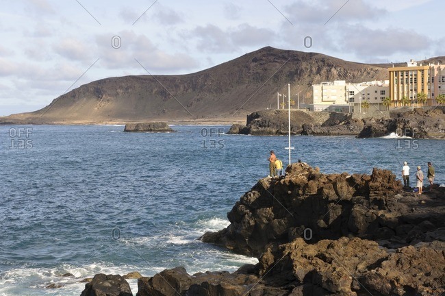 Angler on a cliff, Paseo de la Canteras, Las Palmas de Gran Canaria, Gran Canaria, Canary Islands, Spain