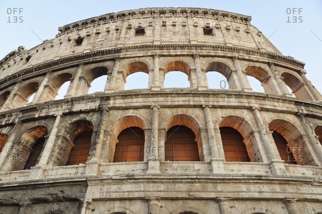 Close-up of the Colosseum in Rome, Italy at dusk
