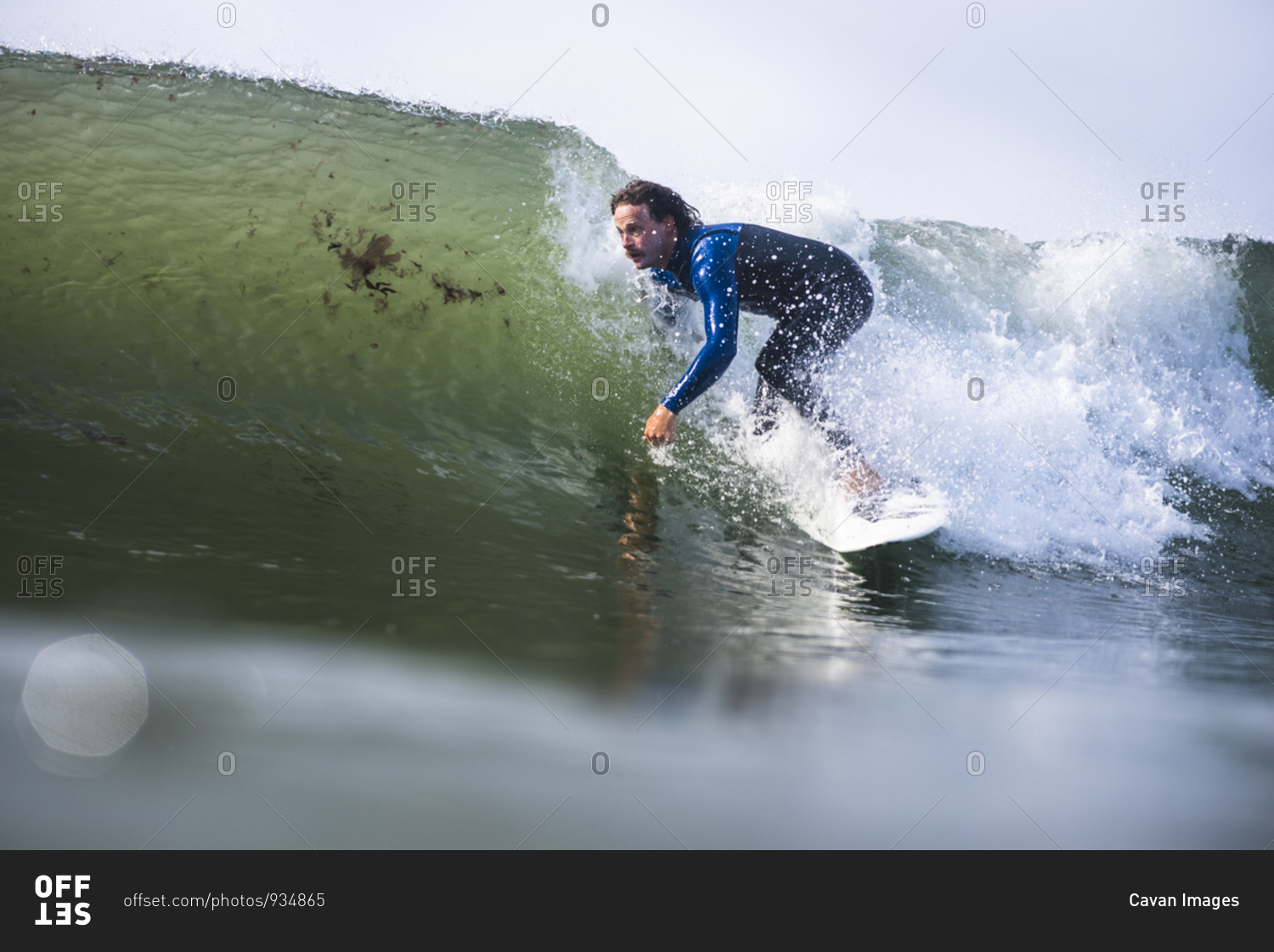 Man surfing in Rhode Island summer stock photo -
OFFSET