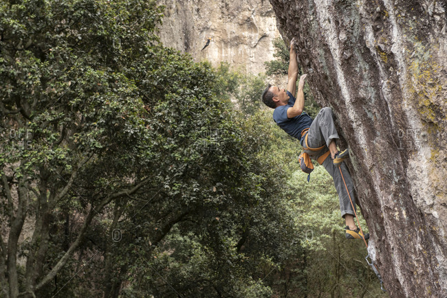 One man rock climbing in Jilotepec, Mexico