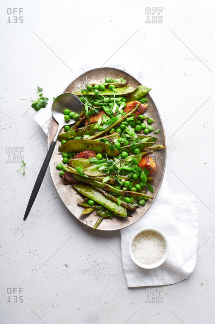 Healthy dinner with chicken stir-fry with snow peas and green beans in miso sauce