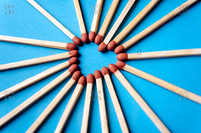 Grouping of matches arranged in a radiant heart shape