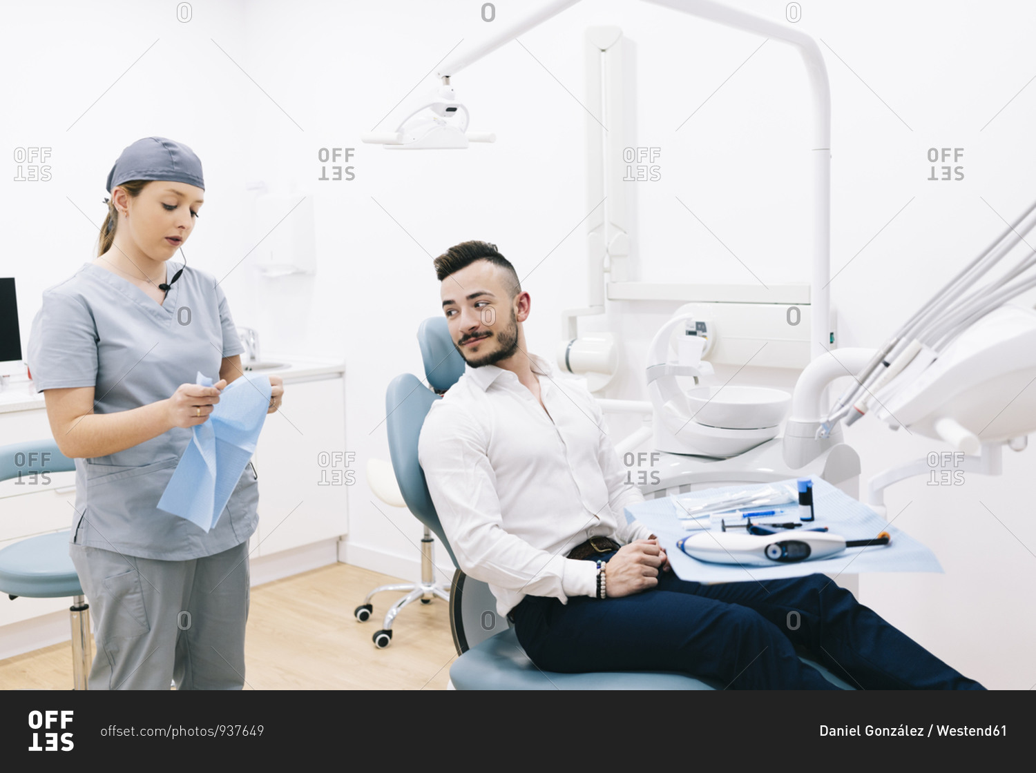 Medical secretary preparing dental treatment for patient