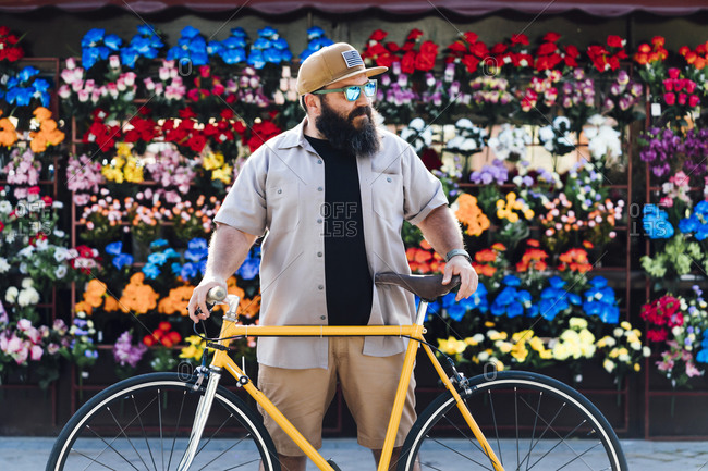 Portrait of bearded man with fixie bike