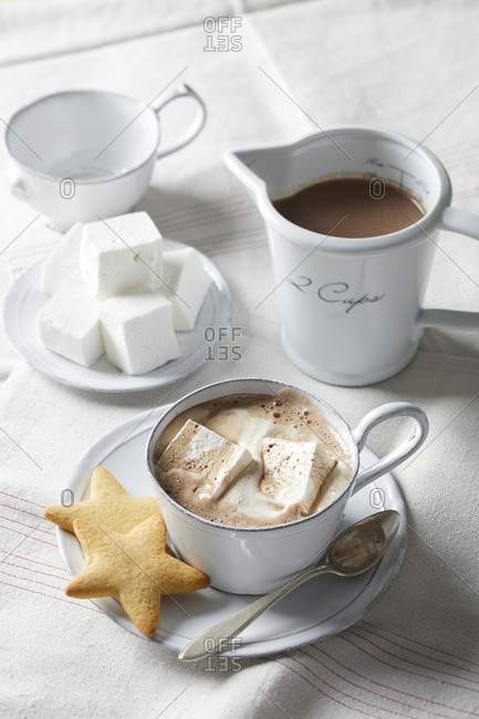 Hot chocolate with homemade marshmallows and star cookies