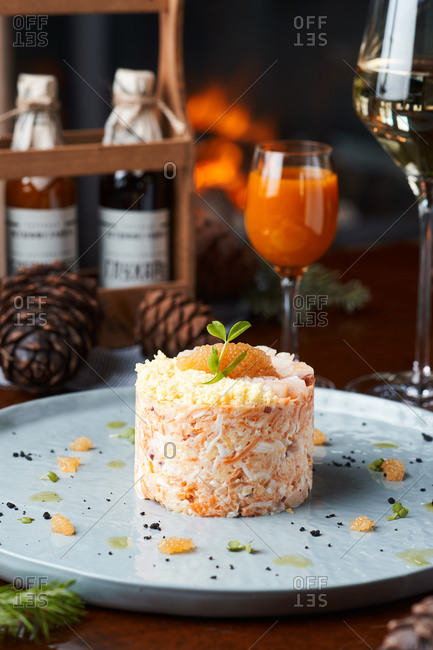 dinner white wine, salad with river white fish and egg, red caviar on top