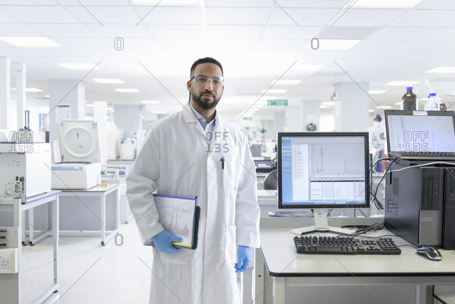 Composite image of male scientist in laboratory