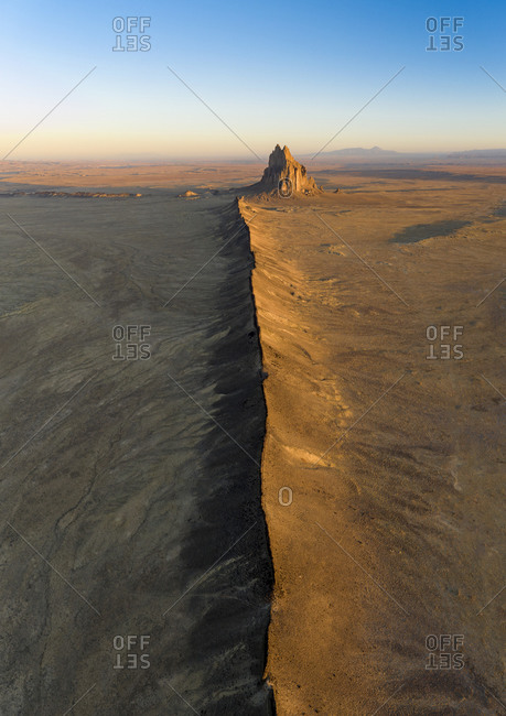 Aerial with leading line of lava towards Shiprock in New Mexico