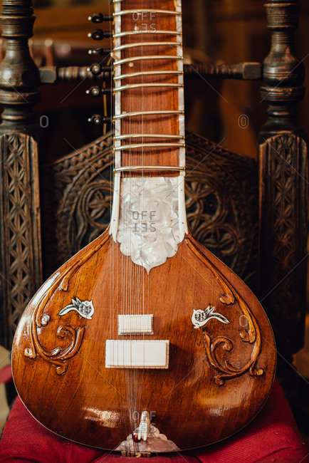 Close up photo of a sitar, traditional Indian musical instrument