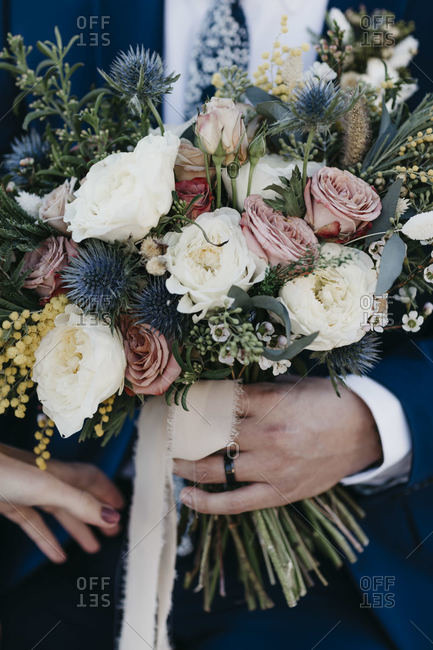 Bridal couple with bridal bouquet