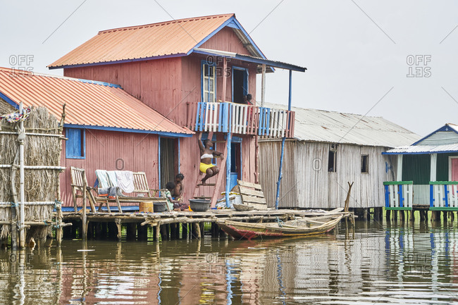 Ganvie, Benin, Africa; November 10, 2019; Ganvie is a lake village in Benin, Africa, lying in Lake Nokou�, near Cotonou. It is probably the largest lake village in Africa. 
Stilt houses are raised on piles all over the lake. The village was created in the sixteenth or seventeenth centuries by the Tofinu people who took to the lake to avoid Fon warriors who were capturing slaves for sale to European traders. The village was added to the UNESCO World Heritage Tentative List on October 31, 1996 in the Cultural category.