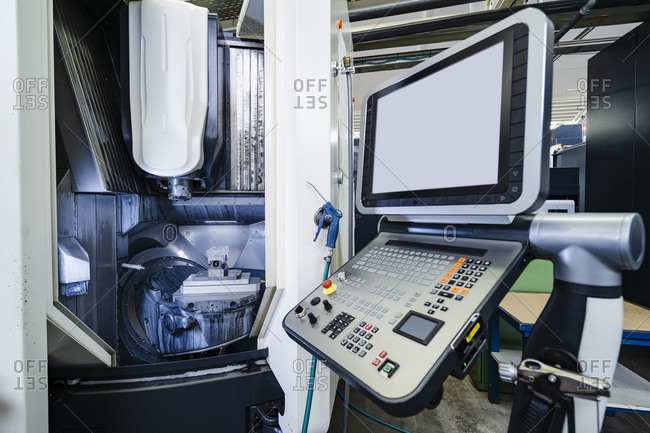 Germany- Bavaria- Munich- Control panel of production hall machinery