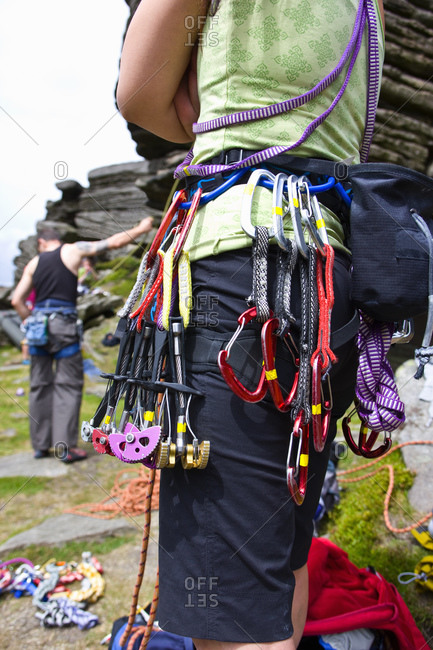 Close up of climbing gear on rock climbing harness