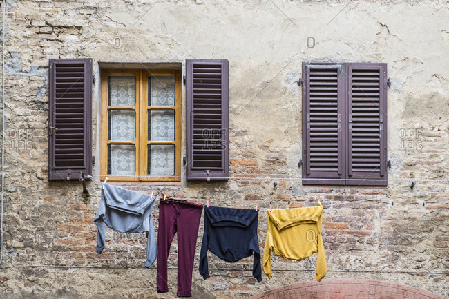 Laundry hanging outside to dry in Florence / Tuscany