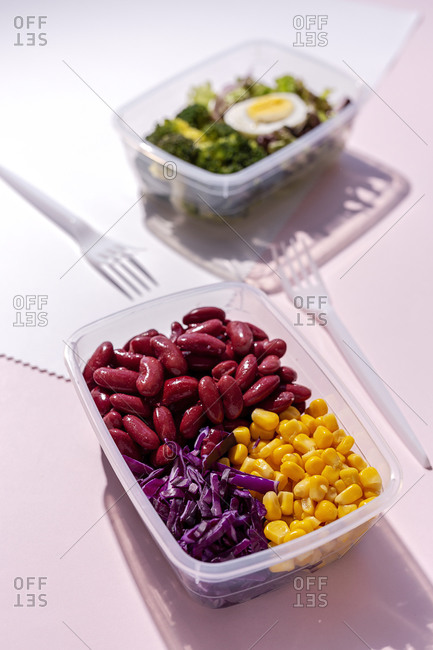Homemade vegan food in lunch boxes with healthy vegetable fresh from above. Vegan food concept. Healthy food. Flat lay. Top view