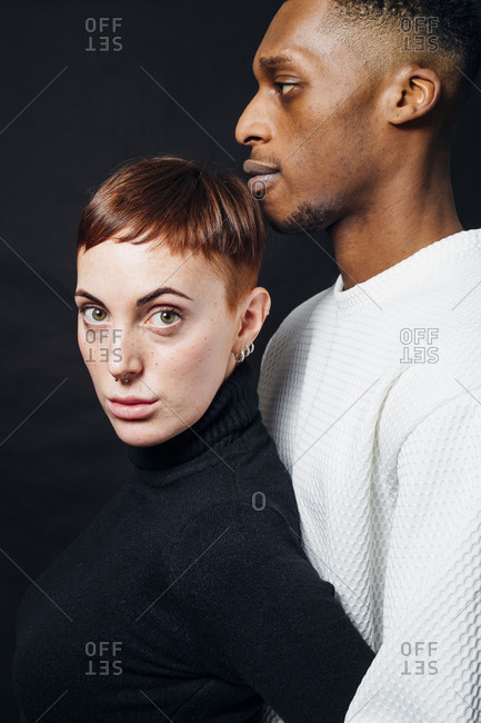 Studio portrait of mixed race couple