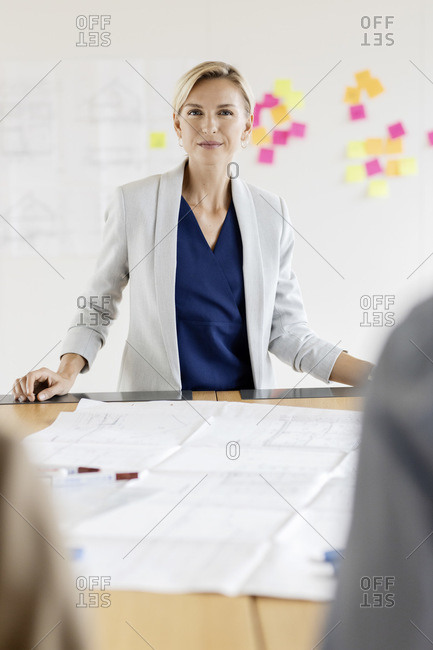 Portrait of confident businesswoman in conference room