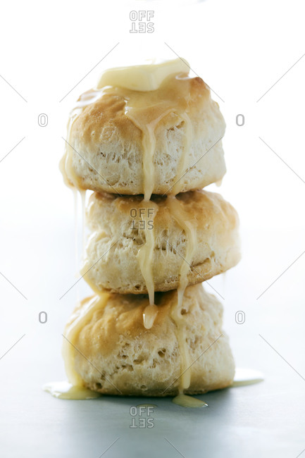 Stack of Buttermilk Biscuits with Butter Dripping
